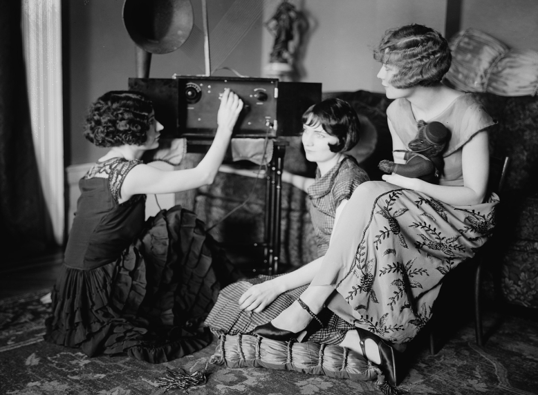 The Brox Sisters tuning a radio